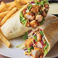 Oriental Chicken Salad Wrap · Our long-running favorite salad, all wrapped up. Crispy breaded chicken tenders with fresh A...