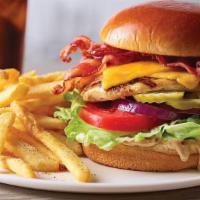 Bacon Cheddar Grilled Chicken Sandwich · Our grilled chicken breast is topped with two strips of Applewood-smoked bacon and Cheddar, ...
