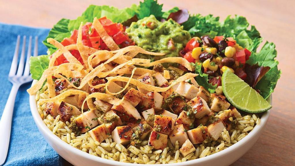 Southwest Chicken Bowl · Grilled chipotle lime chicken on mixed greens and cilantro rice with house-made pico de  gallo, black bean corn salsa and guacamole. Topped with chimichurri, tortilla strips and  a fresh lime wedge.