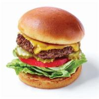 Cheeseburger · Ground beef burger served on a toasted bun with American cheese, lettuce, tomato and pickles .