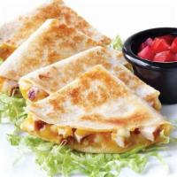Chicken Quesadilla · A flour tortilla filled with chicken and ooey, gooey melted Cheddar cheese. Served with lett...
