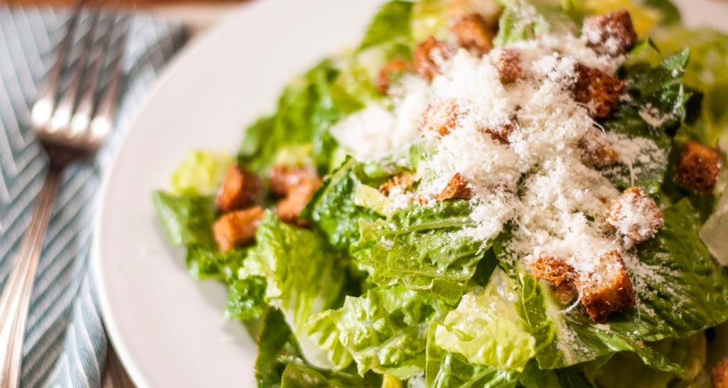 Caesar (Small) · Hearts of romaine, garlic croutons and parmesan - anchovies on request.