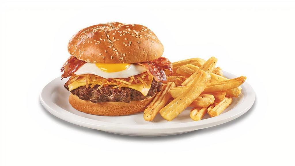 Slamburger™ · Hash browns, an egg*, bacon and American cheese on a brioche bun. Served with wavy-cut fries