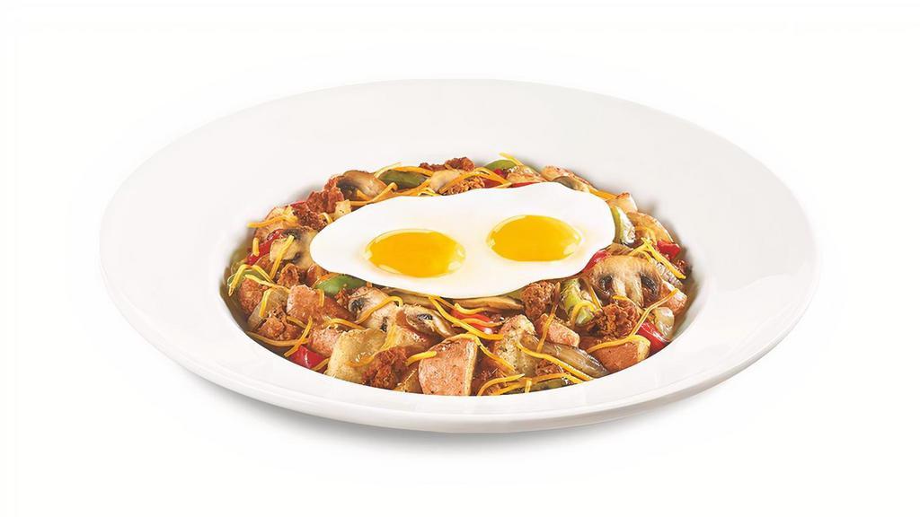 Santa Fe Bowl · Chorizo sausage, fire-roasted bell peppers & onions, mushrooms and seasoned red-skinned potatoes. Topped with Cheddar cheese and eggs*.  .