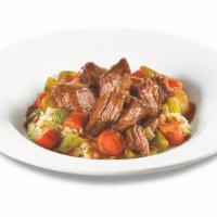 Mama D'S Pot Roast Bowl · Slow-cooked pot roast atop red-skinned mashed potatoes with roasted carrots, celery and onio...