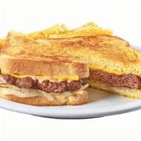 Diner Classic Patty Melt · A 100% beef patty with caramelized onions, Swiss & American cheeses and Diner Q sauce on gri...