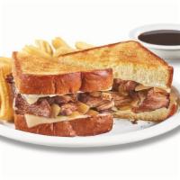 The Big Dipper Melt · Tender pot roast with melted Swiss cheese, caramelized onions and mayo on grilled Texas toas...