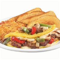 Philly Cheesesteak Omelette · Three-egg omelette with grilled prime rib, fire-roasted bell peppers & onions, sautéed mushr...