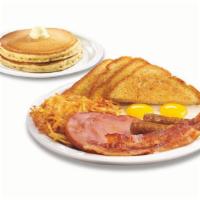 Lumberjack Slam® · Buttermilk pancakes, grilled ham, bacon strips, sausage links, eggs,* hash browns and choice...