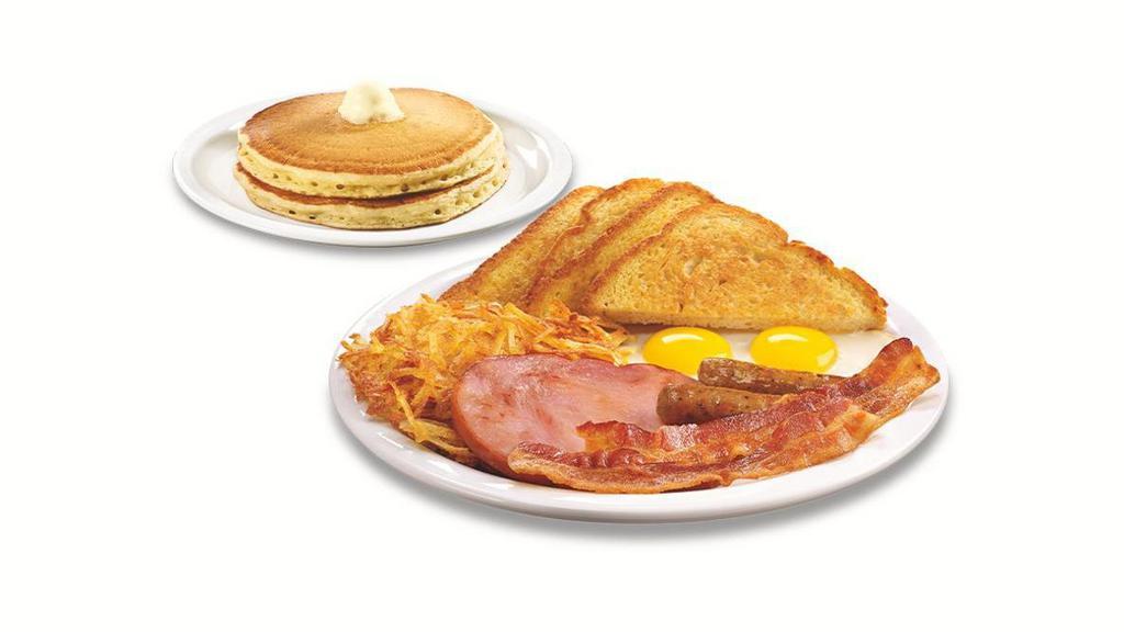 Lumberjack Slam® · Buttermilk pancakes, grilled ham, bacon strips, sausage links, eggs,* hash browns and choice of bread