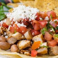 Soft Tacos · Large soft corn tortilla piled with beans, salsa fresca, fresh cheese, and your choice of fi...