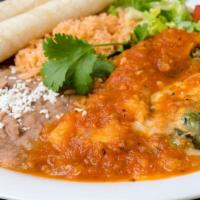 Chile Relleno · Roasted poblano Chile filled with cheese, battered and fried. Served with ranchera sauce, ri...