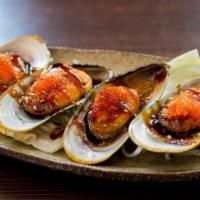 Baked Mussel · with siriracha sauce on top
