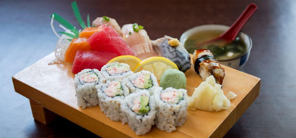 Sushi & Sashimi (14pc) · Tuna (2pc), sake (2pc), CA roll (6pc), hamachi, unagi, albacore and saba.