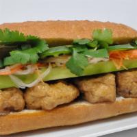 F6. Tofu Sandwich · All include pickled carrots & Dalkon, cucumber, cilantro, jalapenos and mayo on a fresh bagu...