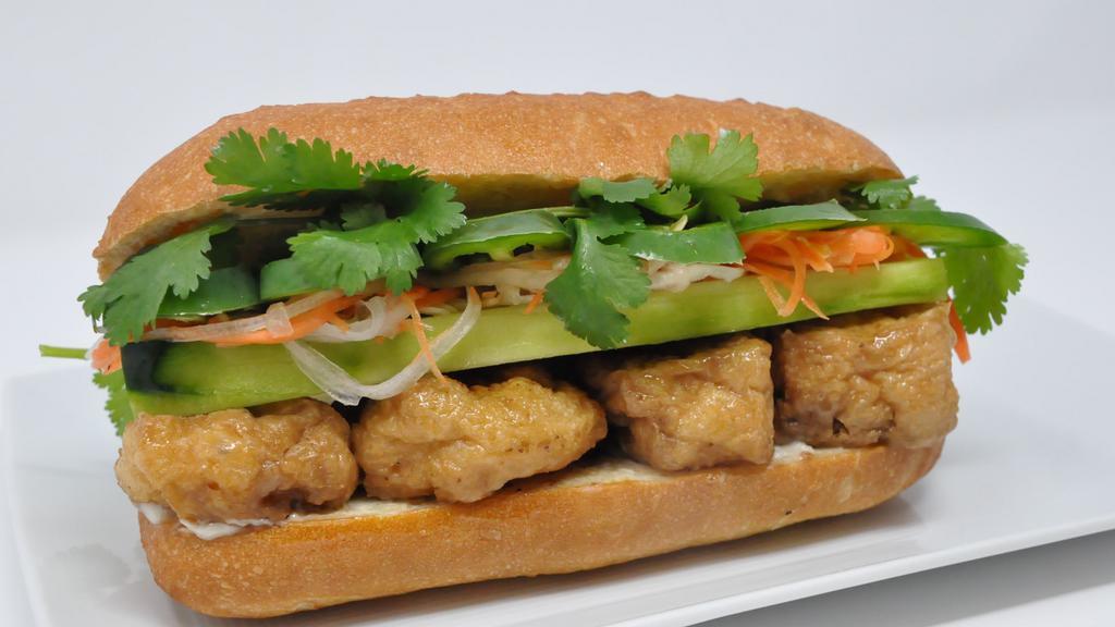 F6. Tofu Sandwich · All include pickled carrots & Dalkon, cucumber, cilantro, jalapenos and mayo on a fresh baguette