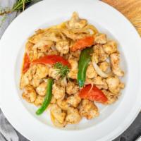 Ye-Doro Tibs · Tender chicken cubes sauteed in Kategna's secret blend of spices, onions, tomatoes, peppers ...