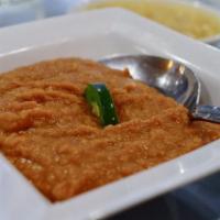 Shiro Wot · Vegetarian. Vegan. Powdered chickpea sauce flavored with onions, herbs, oil, berbere sauce a...