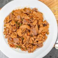 Timatim Fitfit · Vegetarian. Vegan. Pieces of injera tossed in a blend of fresh tomato, green pepper, onion a...