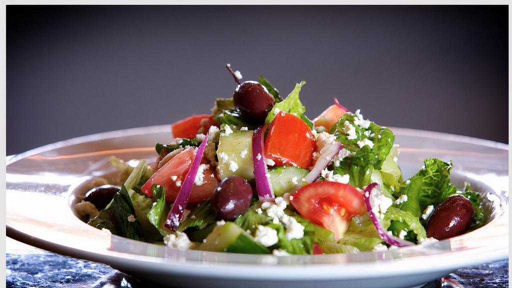 GREEK SALAD · Romaine lettuce, tomato, cucumber, bell pepper, onion, kalamata olives, feta cheese, herb vinaigrette