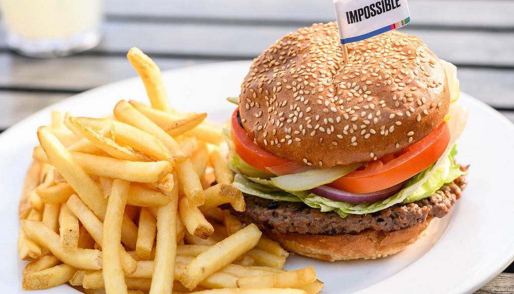 IMPOSSIBLE BURGER (VEGETARIAN) · Patty made entirely from plants, with lettuce, tomato, onion and pickle