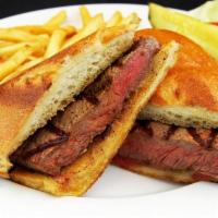 STEAK SANDWICH · 10 oz all-natural angus beef, lettuce, tomato, onion on warm french roll