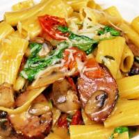ITALIAN PASTA · rigatoni, mild italian sausage, roasted garlic, basil, mushrooms, cherry tomatoes, arugula, ...