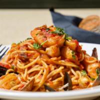 TUTTO MARE · Spaghetti, prawns, clams, mussels, white fish, white wine-tomato sauce, parsley, garlic, chi...