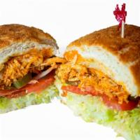 Spicy Chicken · Hot chicken with fire pepper sauce and pepper jack, spicy ranch, shredded lettuce, tomatoes,...