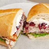 Giving Thanks · Turkey, cream cheese and cranberry sauce with mayo, dijon mustard, romaine lettuce, tomatoes...