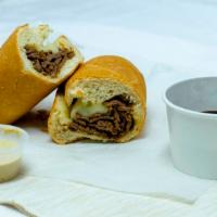 Tri Tip French Dip · Our house-made Tri-Tip & Provolone on Soft French Roll, Oven Baked w/ Au Jus & Creamy Horser...