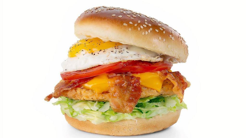 The Hangover Crispy Chicken Sandwich · A crispy chicken breast topped with hardwood-smoked bacon, egg, American cheese, lettuce, tomatoes & mayo.