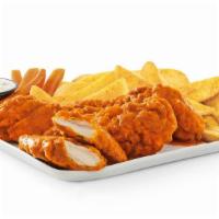 Crispy Buffalo Chicken Tenders & Fries · Breaded and golden-fried chicken tenders tossed in our signature buffalo sauce, served with ...