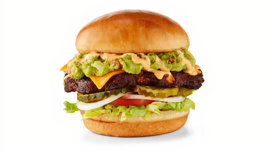 Southwestern Black Bean Burger · Black bean burger topped with cheddar cheese, guacamole, Southwestern Ranch, lettuce, tomato, onion and pickles, served on a Challah bun.