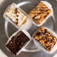 Assorted 4 Pack of Dessert Squares · One of each- seasalt caramel brownie, seven layer, lemon, ridge hike square.