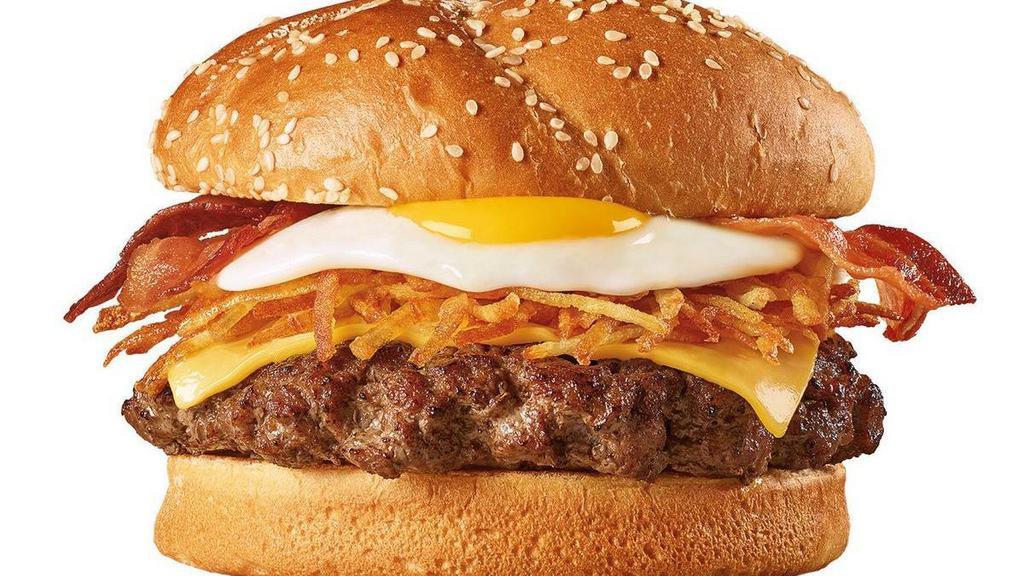 Wake & Bacon Burger · A 100% beef burger with hash browns, an egg*, bacon and American cheese on a brioche bun. .