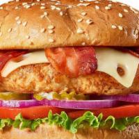 Pig 'N' Chicken Burger · A seasoned grilled chicken breast with Swiss cheese, bacon, lettuce, tomato, red onions and ...