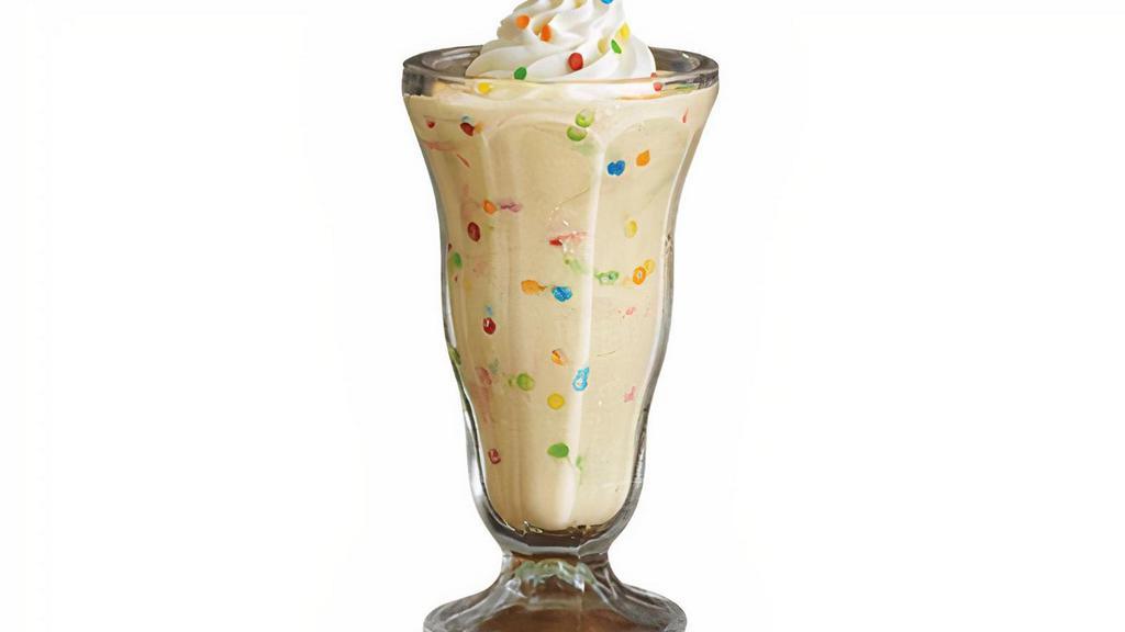 Cake Batter Milk Shake · Made with premium vanilla ice cream blended with cake batter and confetti sprinkles. Topped with whipped cream and more confetti sprinkles.