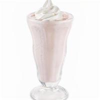 Strawberry Cheesecake Milk Shake · Made with premium vanilla ice cream, strawberry topping and pieces of cheesecake. Topped wit...