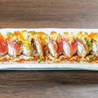 7. Sexy Lady Roll · Raw. Spicy. Shrimp tempura, crab topped with tuna, eel avocado, tobiko & sauce, tempura, Cru...
