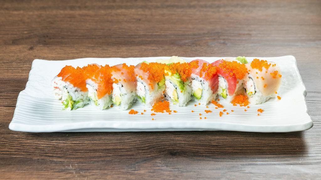 21. Rainbow Roll · Raw. California roll topped with tuna, salmon, hamachi, white fish, tobiko.