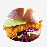 Cali-Style Fried Chicken Sandwich · Buttermilk fried chicken sandwich with avocado, lettuce, tomato, grilled onions, Swiss chees...