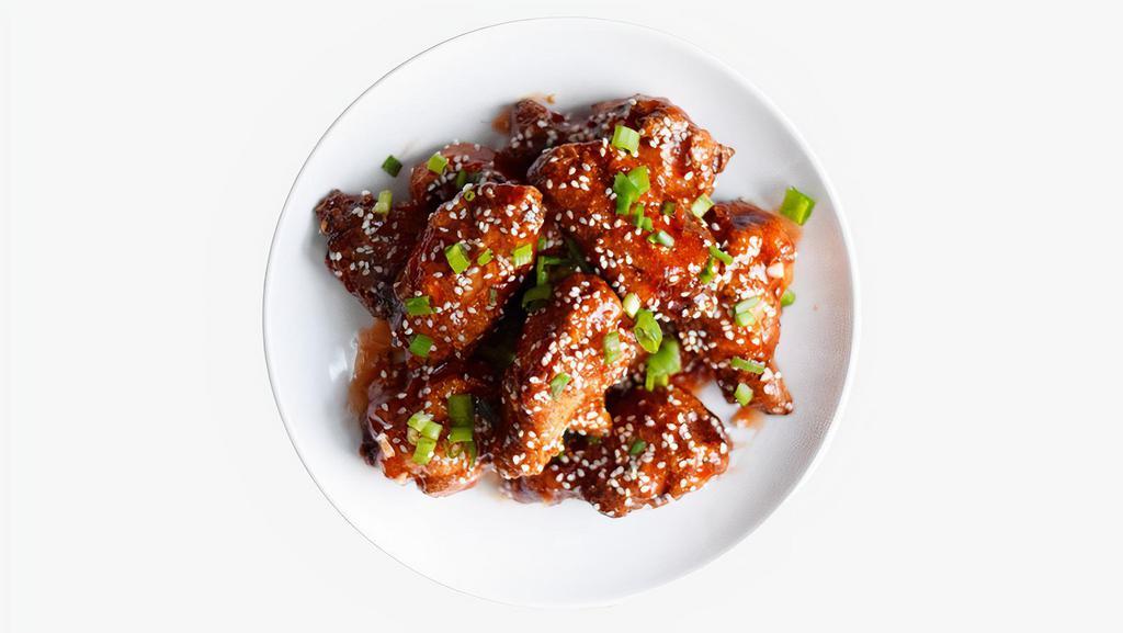 Fried Korean Chicken Wings · (6) bone-in wings tossed in house sweet spicy sauce, tossed with sesame seeds, scallions and served with dipping sauce.