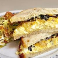 Breakfast Sandwich · Choice of meat, egg and cheese on wheat bread.