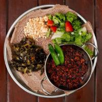 Kitfo (Beef) · A timeless Ethiopian Classic! Minced Raw Meat that is steeped in Nitter Kibbeh- an Ethiopian...
