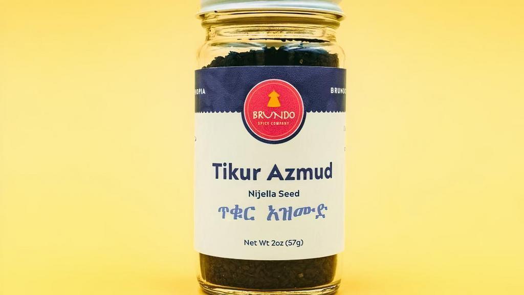 Tikur Azmud |ጥቁር አዝሙድ| Nigella Seed · Ethiopian Nigella Seed.. The rich, nutty flavors of Brundo’s Tikur Azmud are brought to you by the careful hand harvesting efforts of our dedicated farmers in the foothills of Modjo, Ethiopia.. A staple in many Ethiopian spice blends, Tikur Azmud’s pungent flavor complements the distinct palettes of hot chili peppers frequented in Ethiopian cuisine. . Suggested Uses: Add to base of wot dishes for enhanced flavor, baking bread, berbere sauces, and the preparation of clarified butter. Whole Seed . Origin: Ethiopia. Ingredients: Whole Ethiopian Nigella seeds