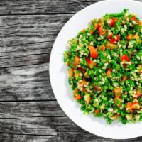Vegan Tabbouleh · Medditeranean-styled salad made with fresh cracked wheat, diced parsley, diced tomatoes, dic...