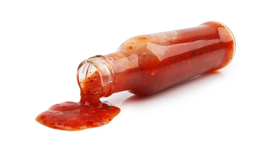 12 oz Hot Sauce · Exquisite spicy hot sauce used in most of our dishes that are chosen to be spicy.