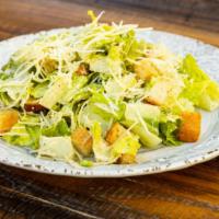 Caesar Salad · Chopped romaine, creamy caesar dressing, parmesan cheese & garlic croutons.