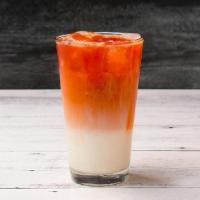 Thai Tea · Classic Thai Tea topped with a delicate layer of house-made creamy sweet milk. ICED LARGE ONLY